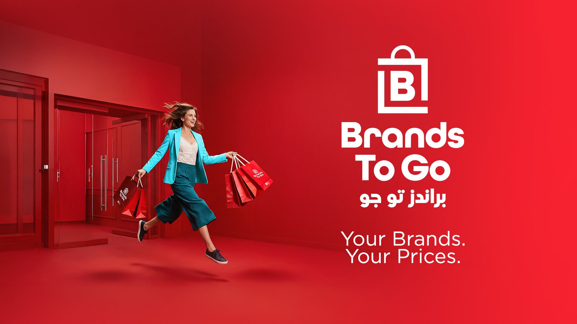 Brands To Go key visual: a shopper leaping with red Brands To Go bags beside the logo and the line Your Brands. Your Prices.